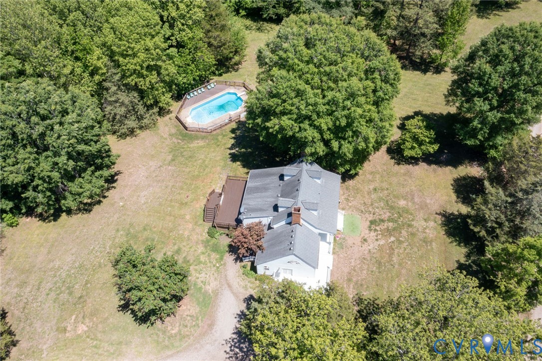 3355 Duke Road Powhatan, VA 23139 - Photo 67 of 67 an aerial view of a house with a yard and lake view