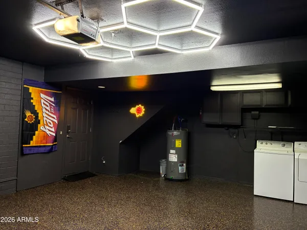 a view of an empty room with a flat screen tv