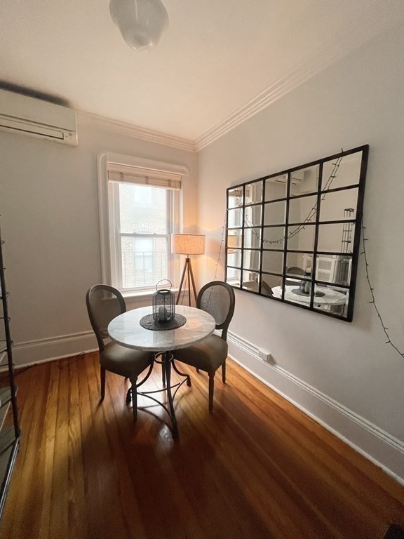 145 Charles Street, Unit 4 Boston, MA 02114 - Photo 17 of 24 a view of a workspace with furniture and window