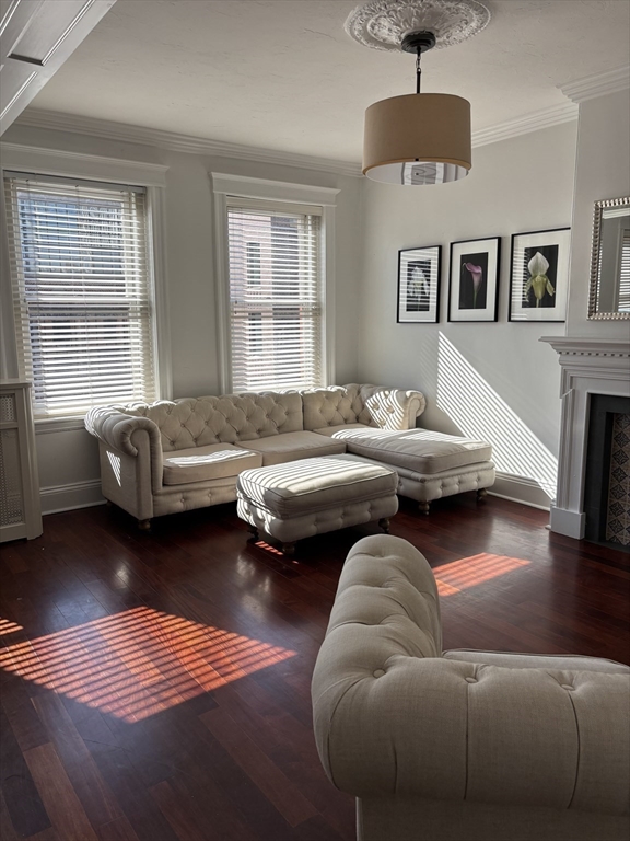 145 Charles Street, Unit 4 Boston, MA 02114 - Photo 2 of 24 a living room with furniture window and wooden floor