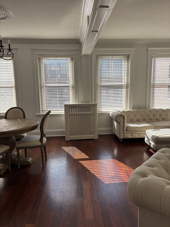 145 Charles Street, Unit 4 Boston, MA 02114 - Photo 4 of 24 a living room with furniture and a window
