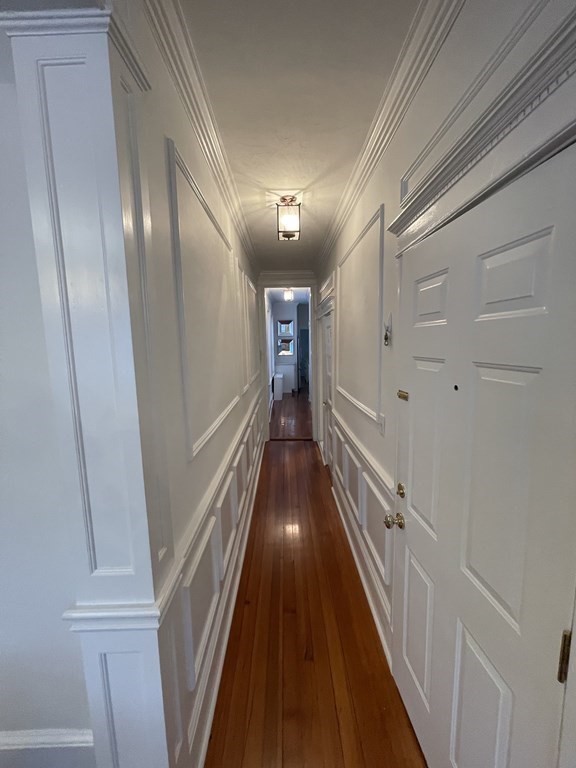 145 Charles Street, Unit 4 Boston, MA 02114 - Photo 9 of 24 a view of gallery with stairs