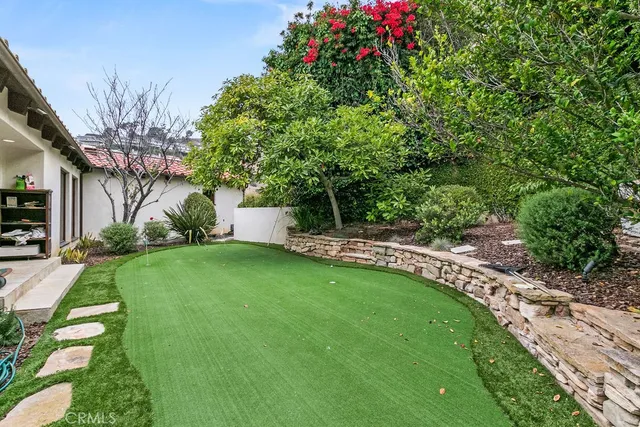 a view of a balcony with chairs