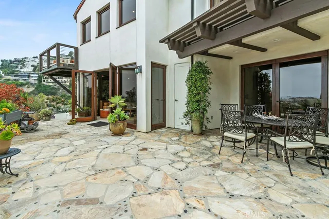 a kitchen with a sink and wooden cabinets
