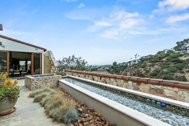 a bed room with a bed and a large window