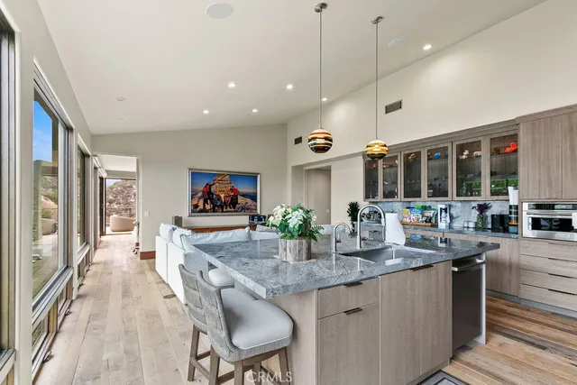 a view of a house with roof deck front of house