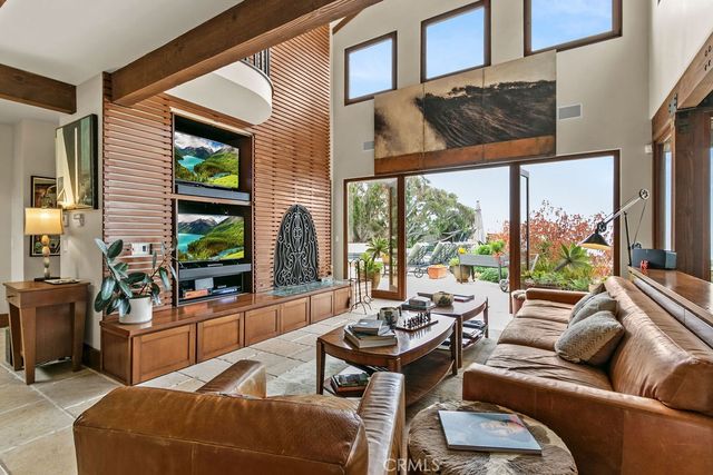 a kitchen with stainless steel appliances granite countertop a sink and stove