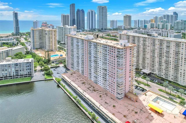 a view of a city with tall buildings