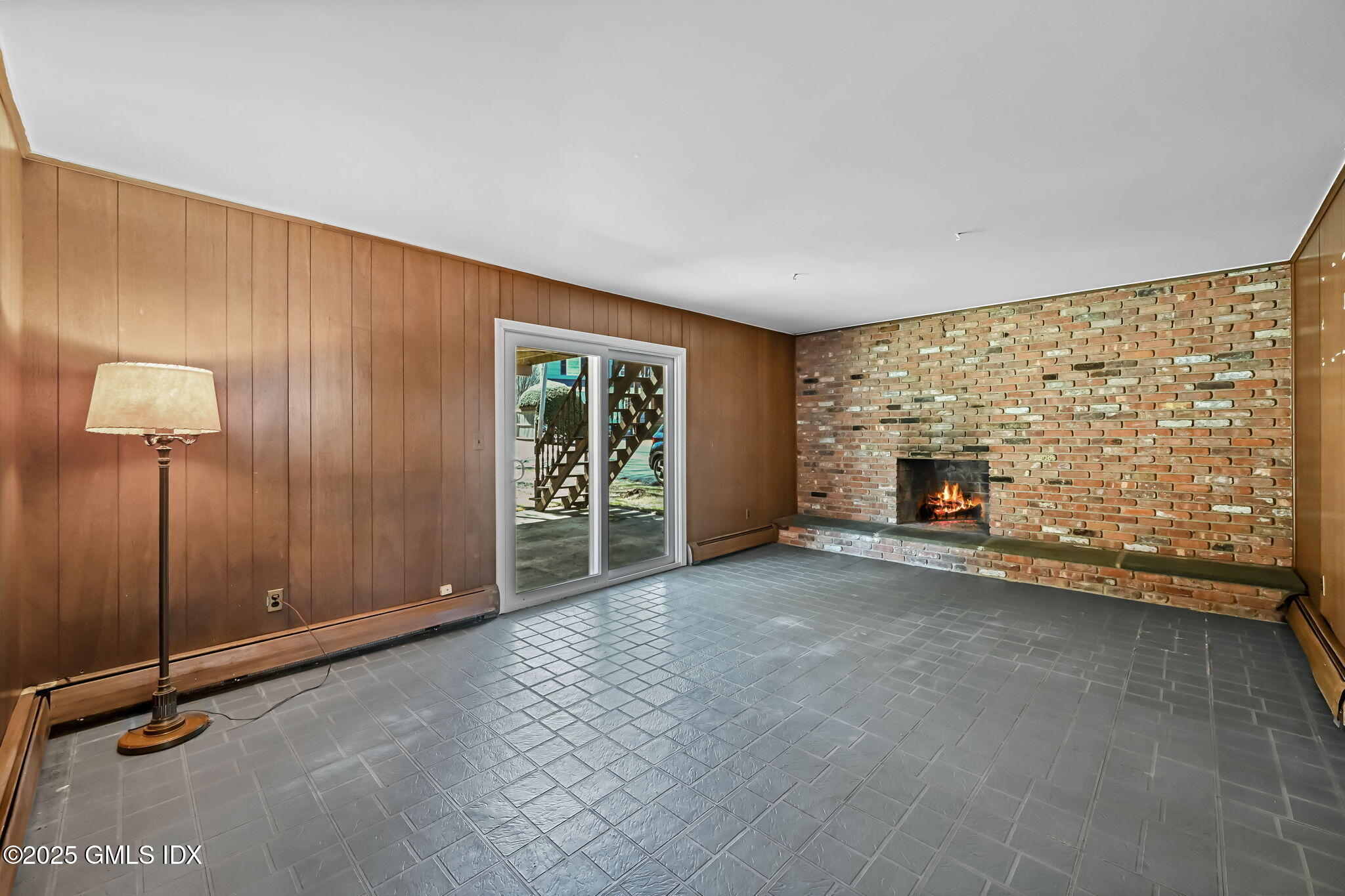 12 Griffith Road Riverside, CT 06878 - Photo 9 of 13 a view of an empty room with a fireplace