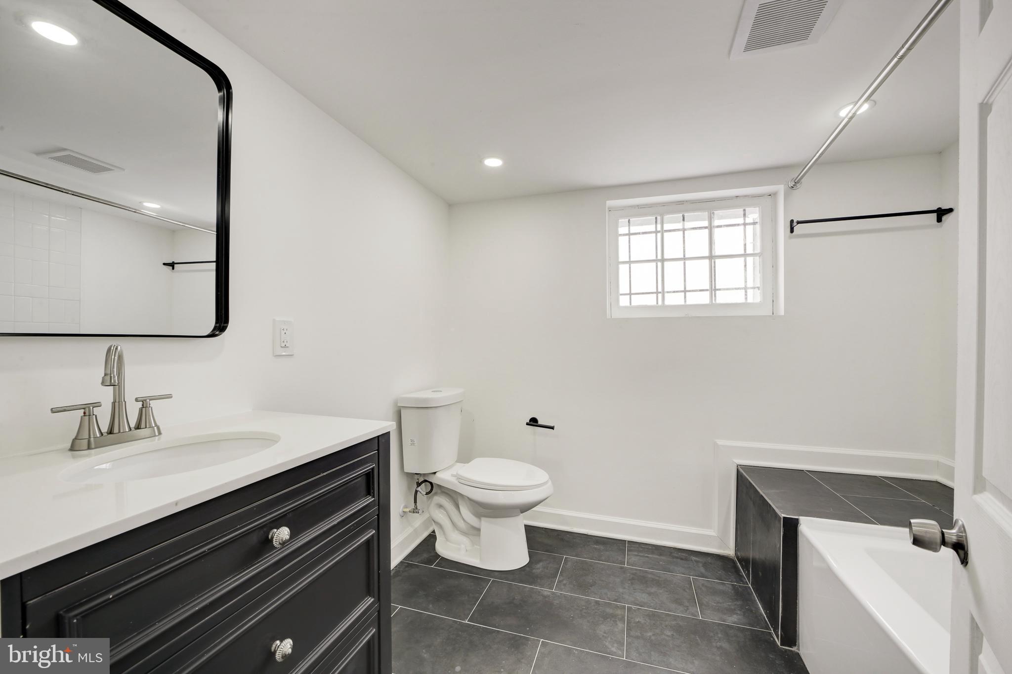 3214 5th Street Southeast Washington, DC 20032 - Photo 31 of 39 Lower level bathroom