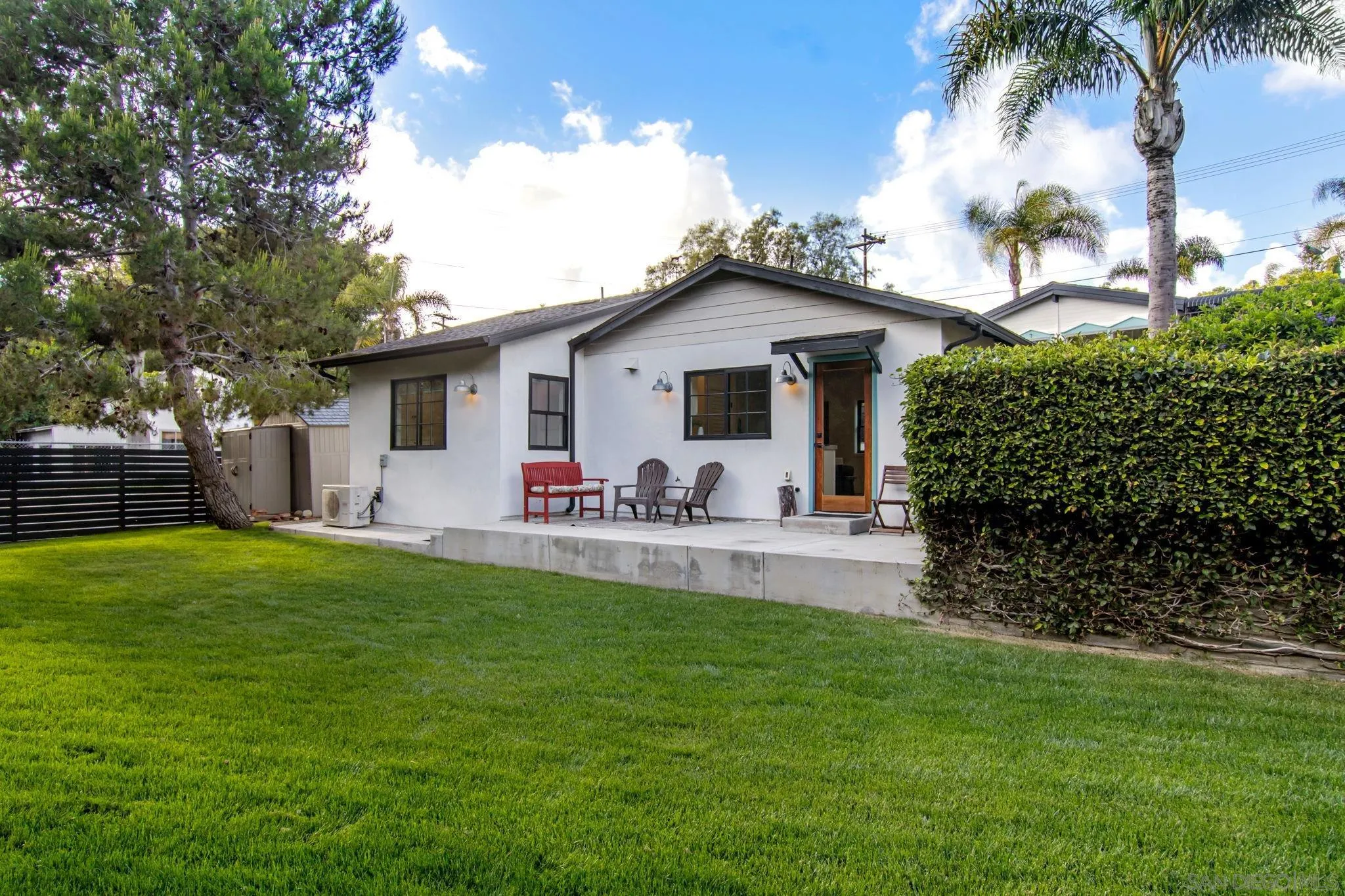 2335 Ivy Road Oceanside, CA 92054 - Photo 38 of 53 a front view of house with yard and outdoor seating