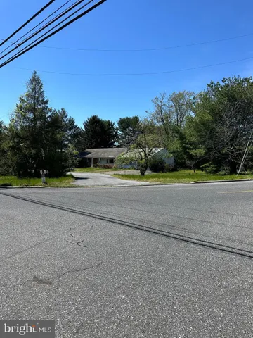 a view of a road with a trees