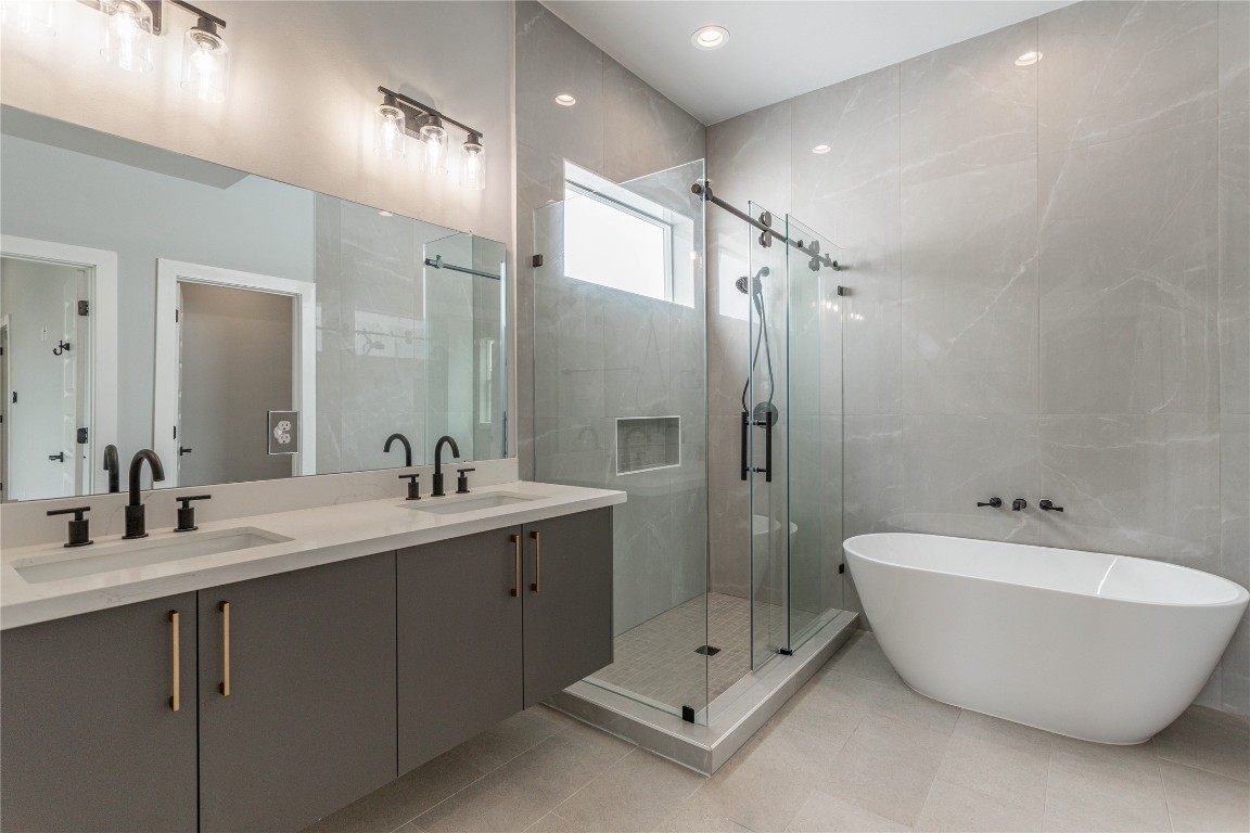 711 Boundary Street Houston, TX 77009 - Photo 20 of 26 a bathroom with a double vanity sink mirror and double
