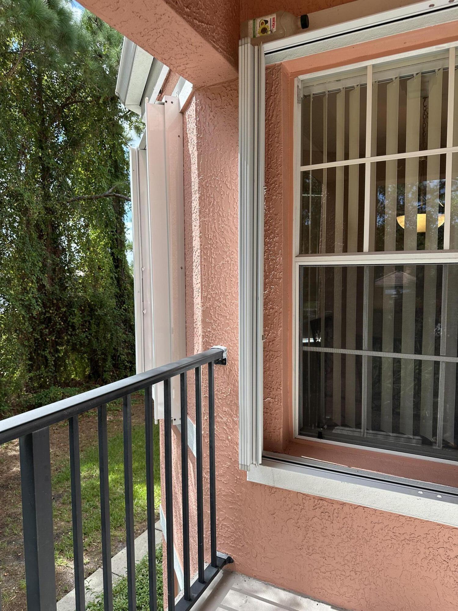 112 Southwest Peacock Boulevard, Unit 7202 Port St. Lucie, FL 34986 - Photo 11 of 11 a view of a balcony