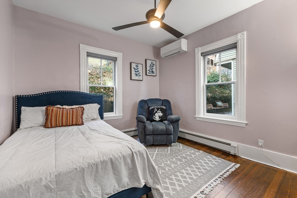 62 Atherton Road, Unit 1 Brookline, MA 02446 - Photo 23 of 24 a bedroom with a bed and a window