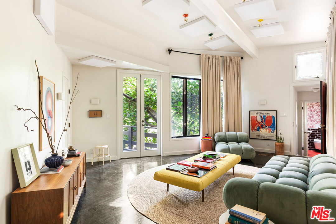 8577 Brier Drive Los Angeles, CA 90046 - Photo 12 of 39 a living room with furniture and a large window