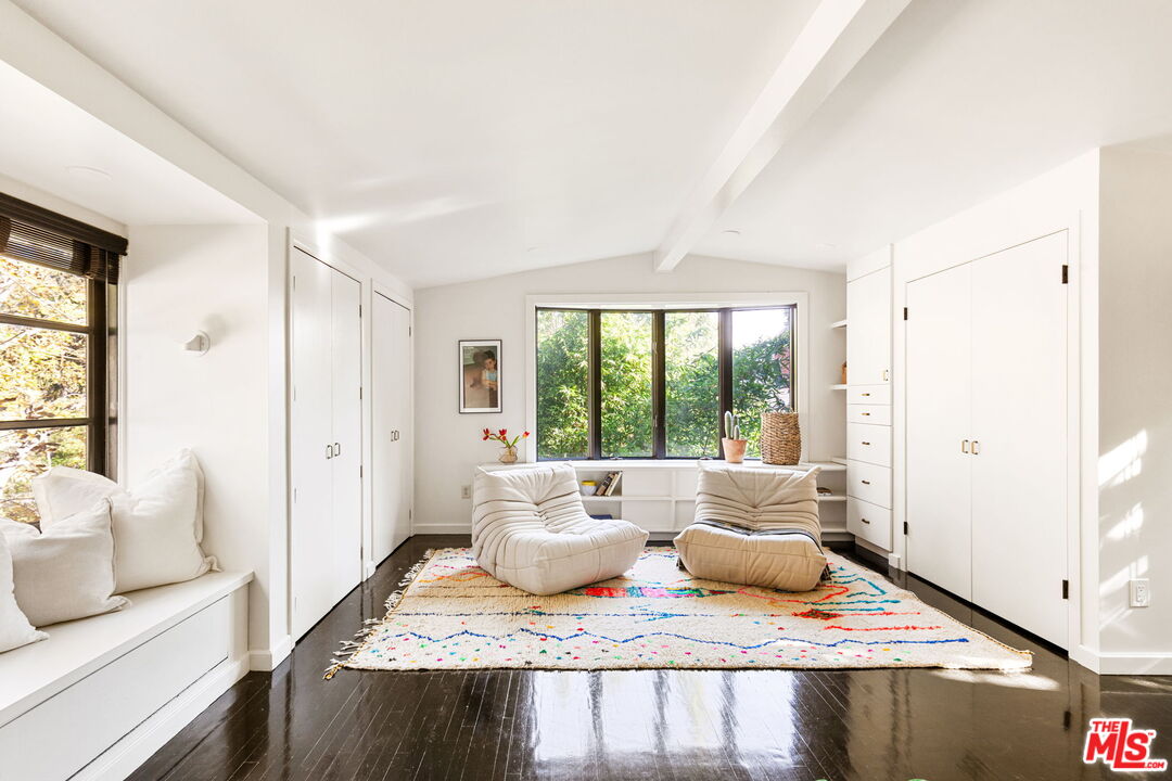 8577 Brier Drive Los Angeles, CA 90046 - Photo 21 of 39 a living room with furniture and a large window