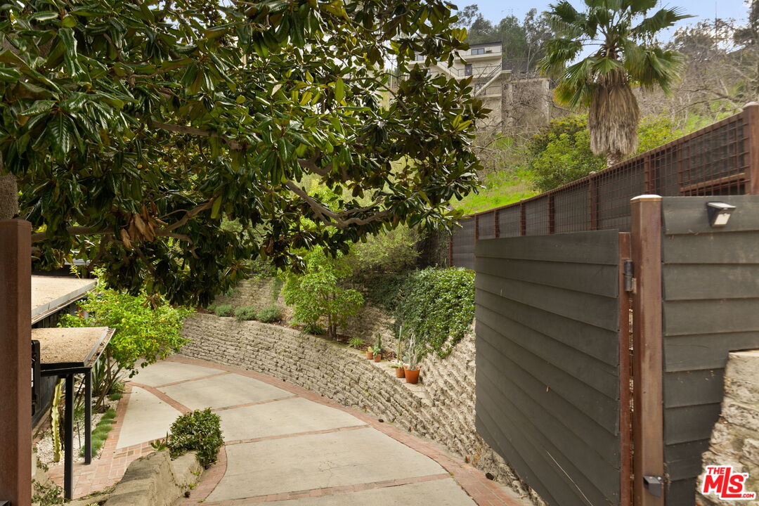 8577 Brier Drive Los Angeles, CA 90046 - Photo 3 of 39 a view of a house with a tree