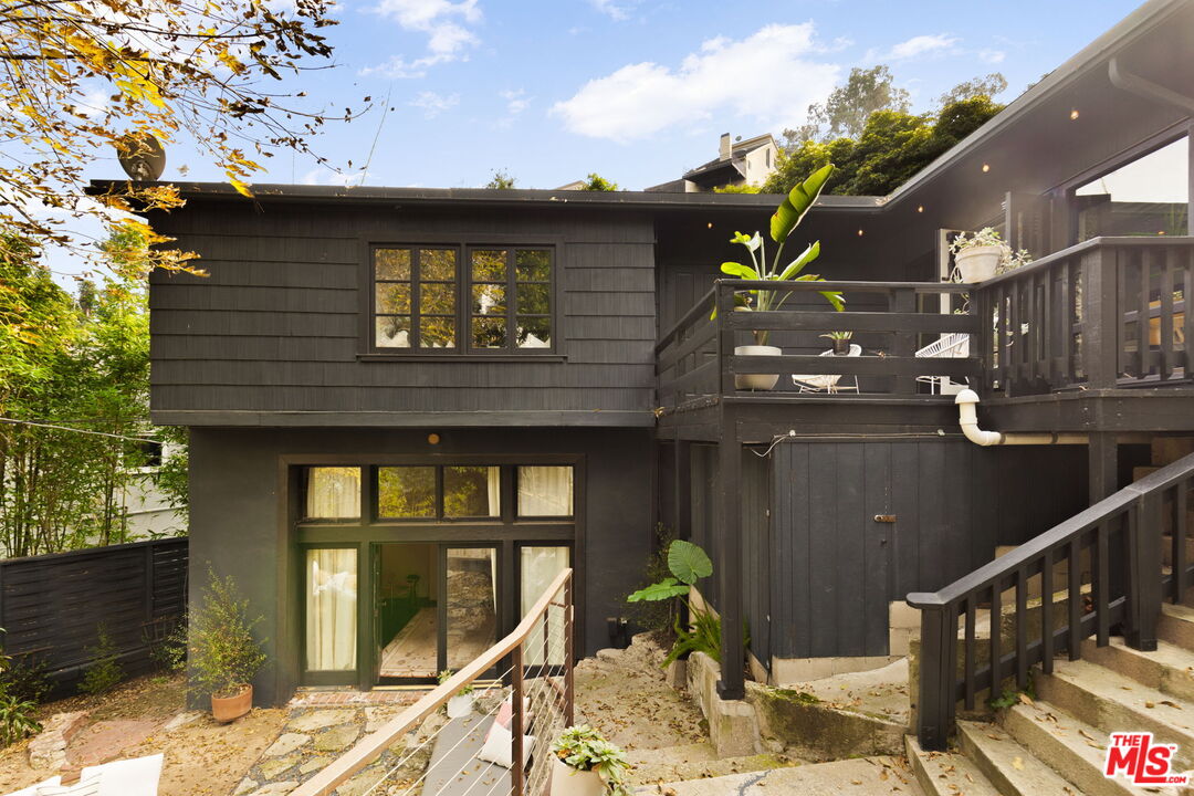 8577 Brier Drive Los Angeles, CA 90046 - Photo 33 of 39 a front view of a house with parking walls