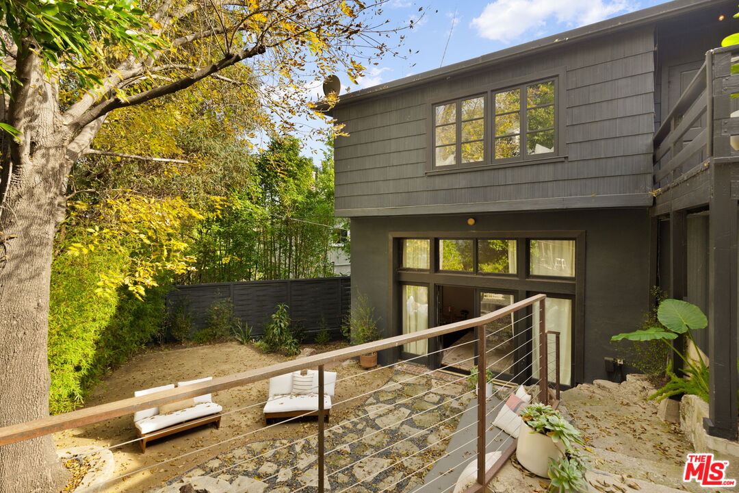 8577 Brier Drive Los Angeles, CA 90046 - Photo 34 of 39 a front view of a house with a yard