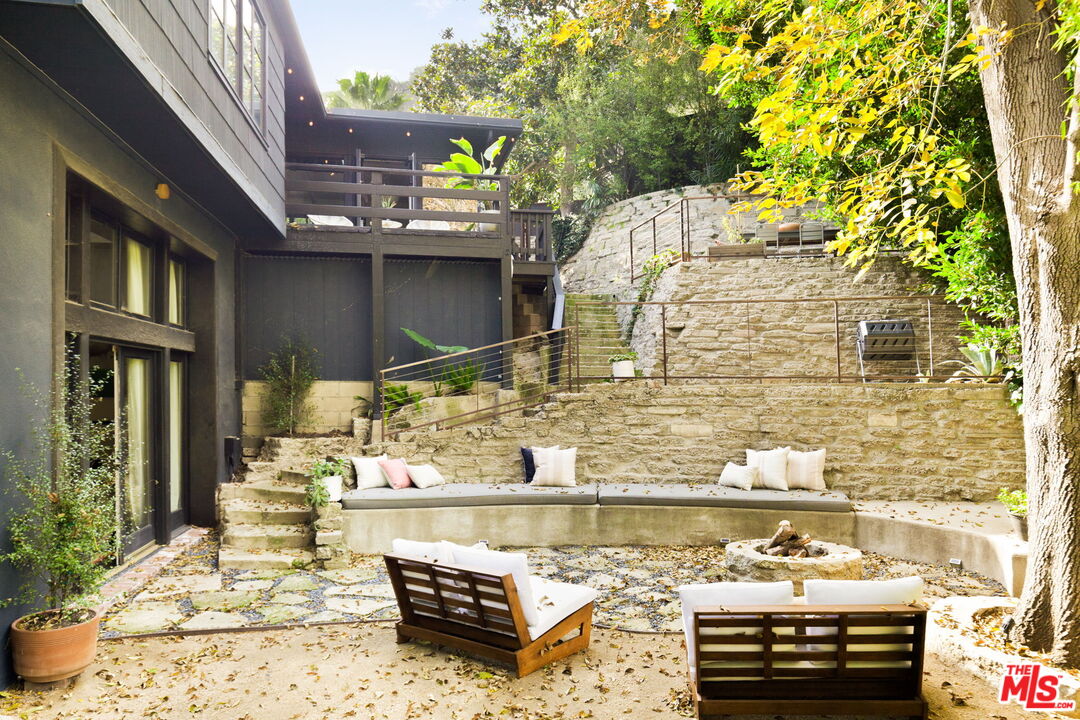 8577 Brier Drive Los Angeles, CA 90046 - Photo 35 of 39 a view of a swimming pool with a patio