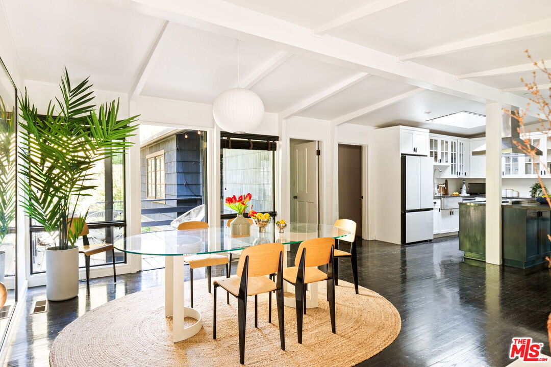 8577 Brier Drive Los Angeles, CA 90046 - Photo 4 of 39 a dining room with furniture and wooden floor
