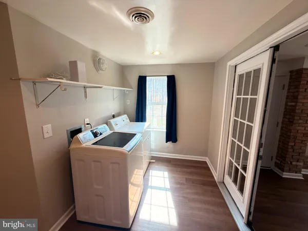 a room with furniture and a window