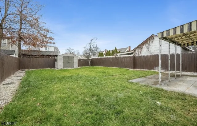 a house view with swimming pool in front of it