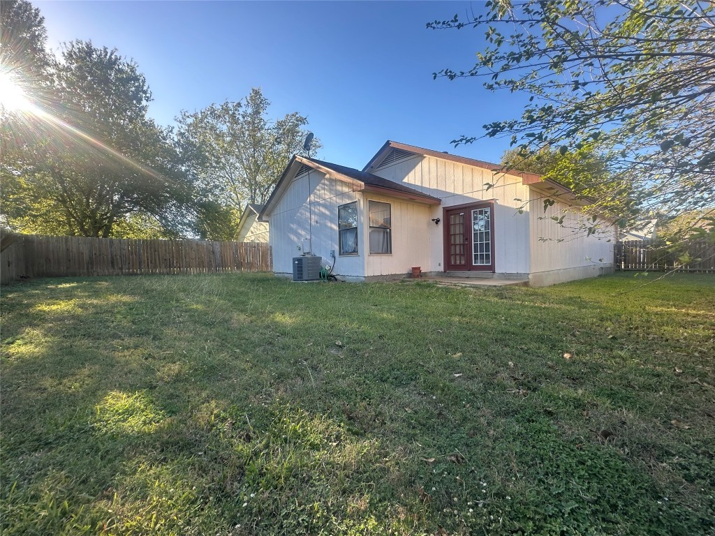 903 Greenbriar Loop Round Rock, TX 78664 - Photo 19 of 19 a view of a house with a big yard and large tree
