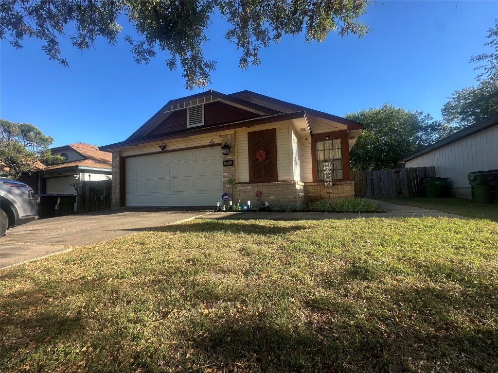 903 Greenbriar Loop Round Rock, TX 78664 - Photo 2 of 19 a front view of house with yard