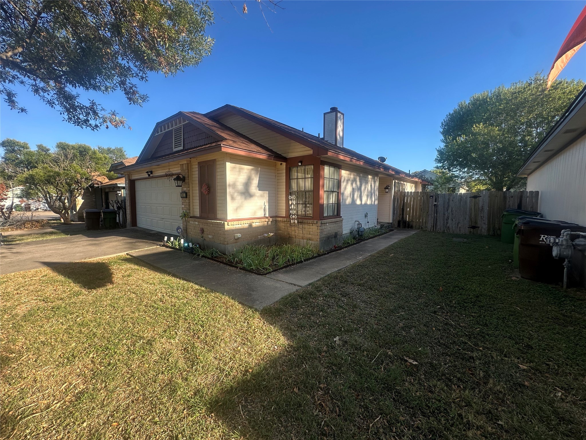 903 Greenbriar Loop Round Rock, TX 78664 - Photo 3 of 19 a view of a house with a yard