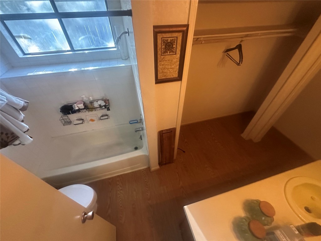 903 Greenbriar Loop Round Rock, TX 78664 - Photo 8 of 19 a bathroom with a shower