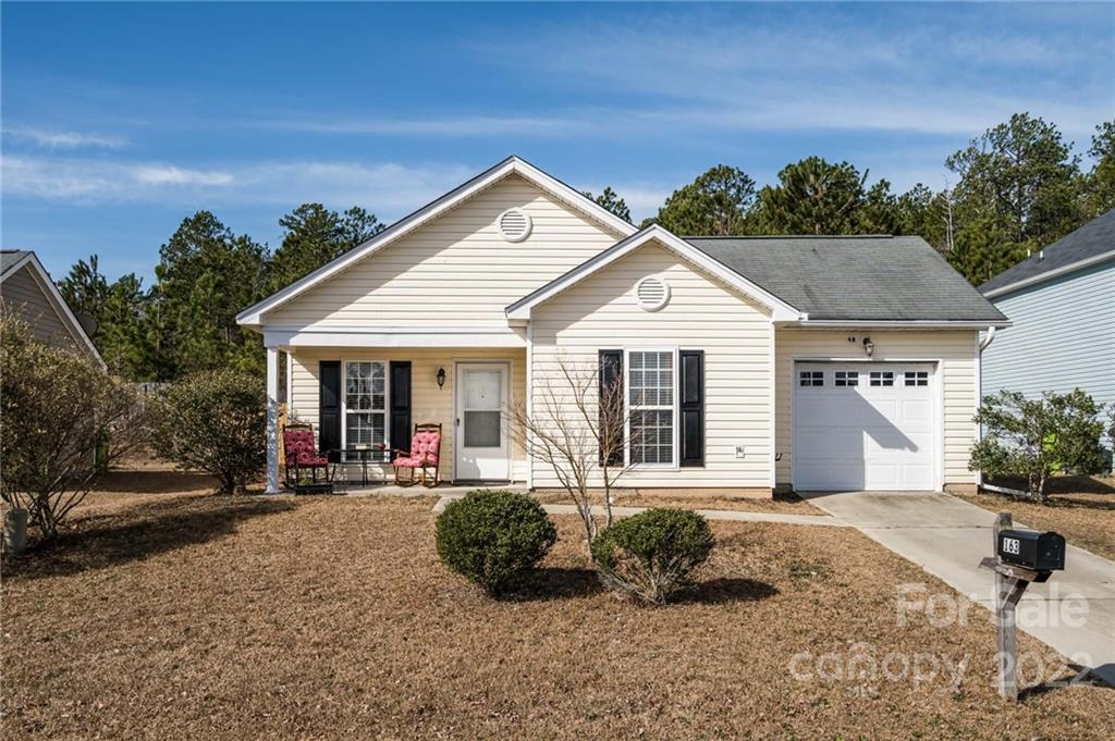 163 Trillium Road Columbia, SC 29229 - Photo 1 of 22 a front view of a house with a porch