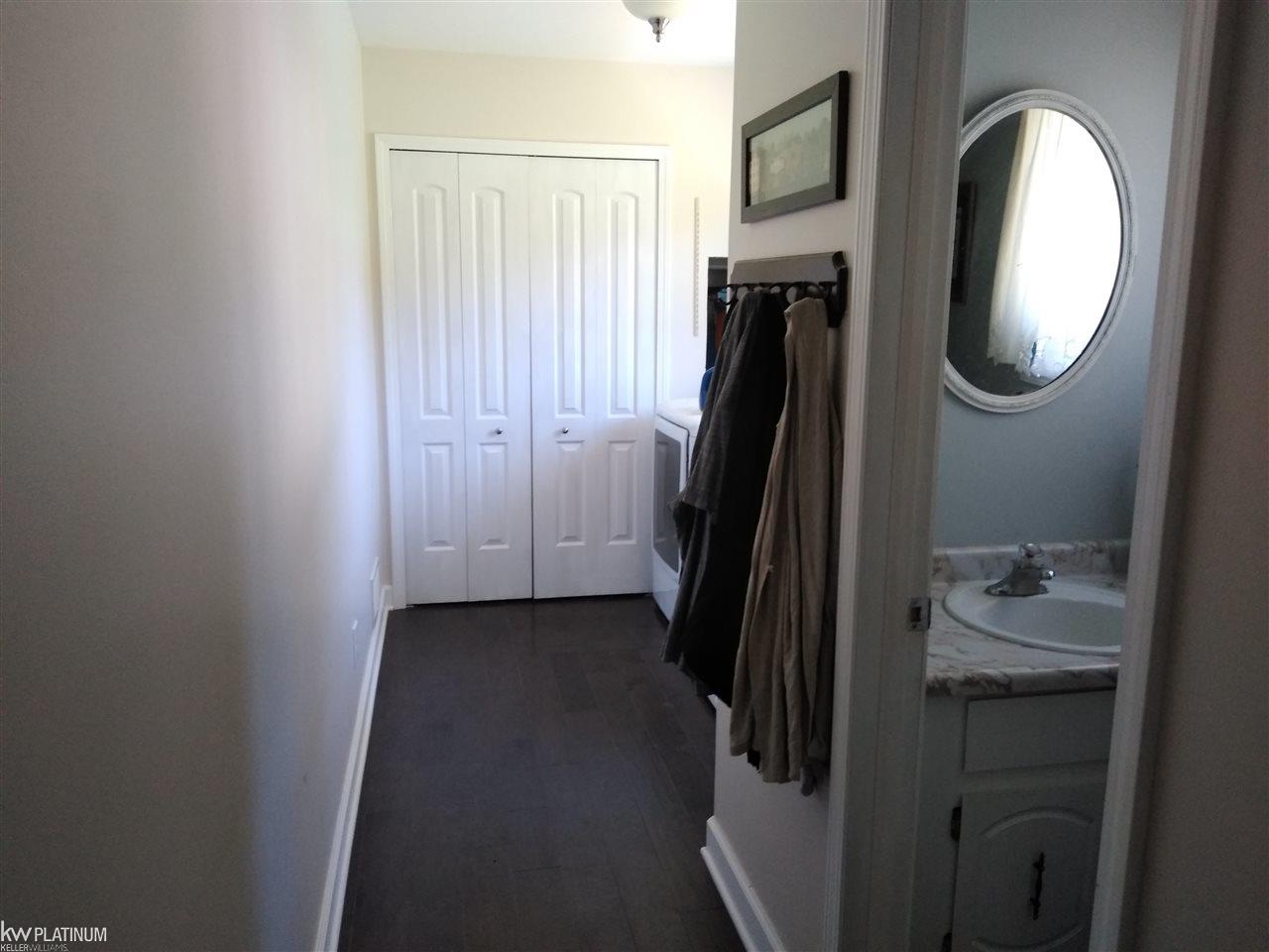 9242 Webb Road Goodells, MI 48027 - Photo 53 of 68 Laundry/Bath