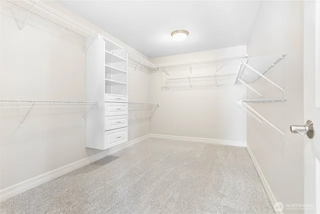 a view of an empty walk in closet