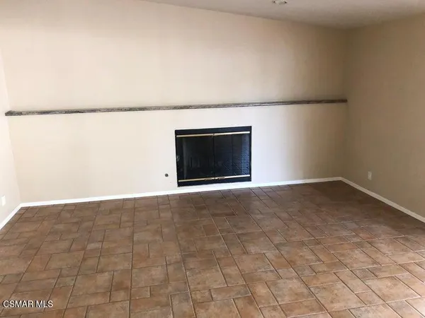 a view of small space with wooden floor