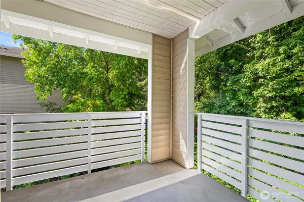 a view of a porch with a bench