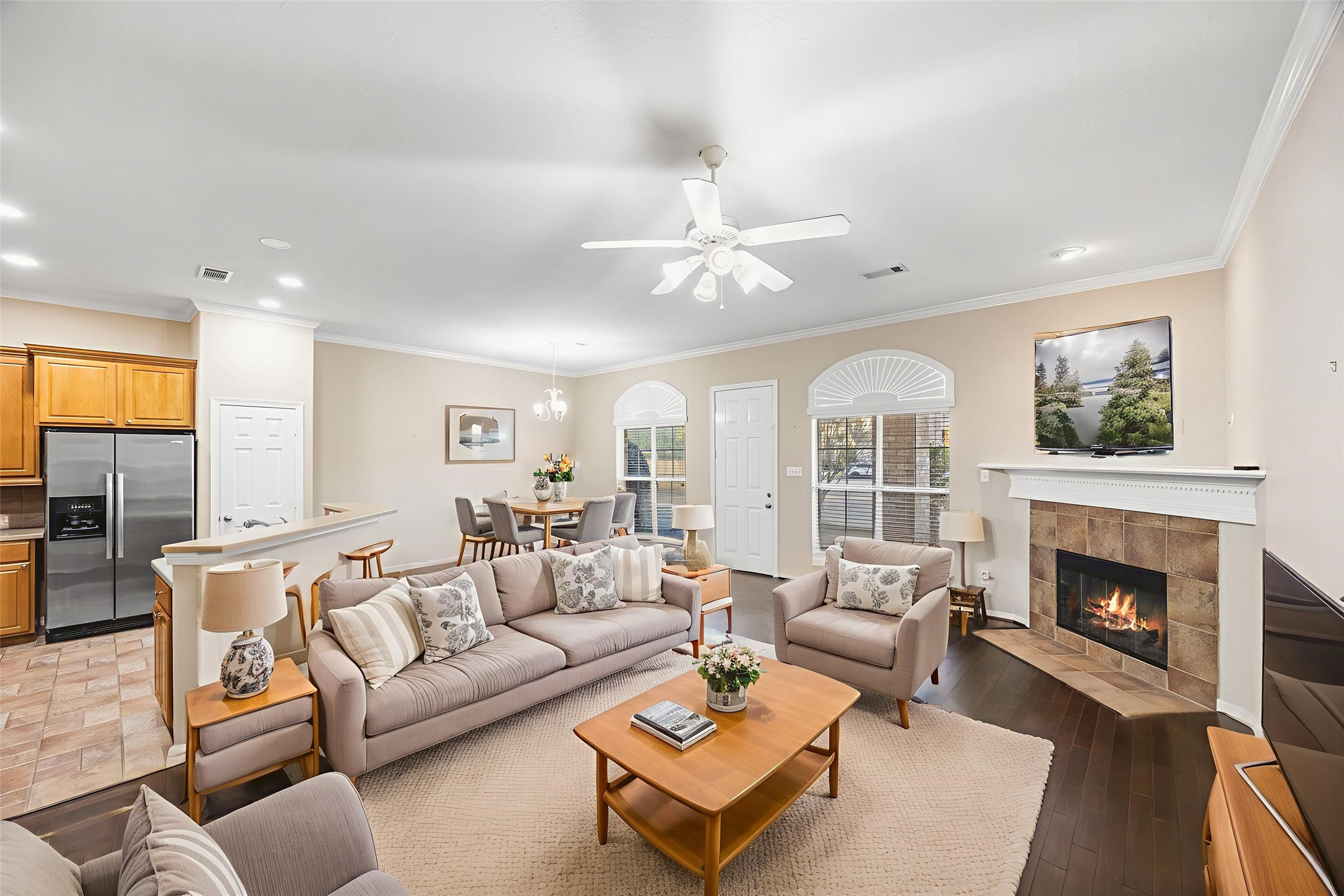 12755 Mill Ridge Drive, Unit 703 Cypress, TX 77429 - Photo 2 of 31 a living room with furniture fireplace and a table