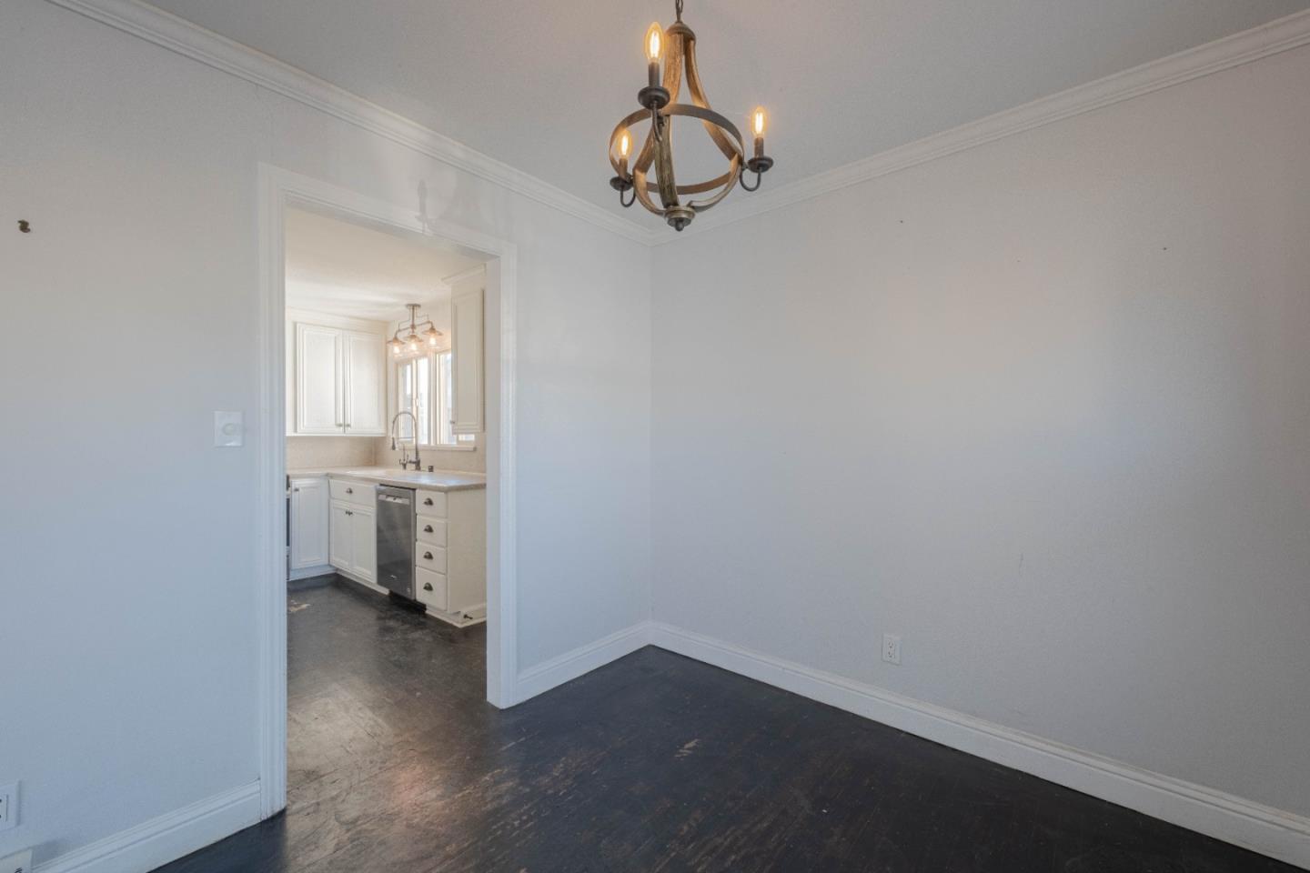 89 Clark Street Salinas, CA 93901 - Photo 11 of 35 a view of a room with wooden floor and windows