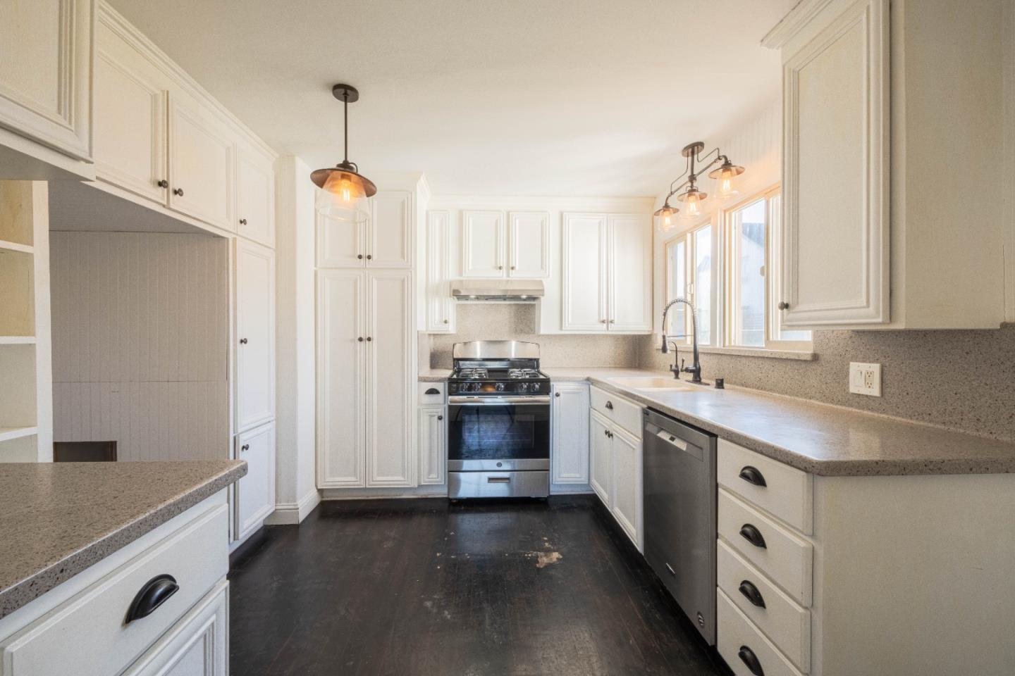 89 Clark Street Salinas, CA 93901 - Photo 12 of 35 a kitchen with stainless steel appliances a stove a sink and a refrigerator