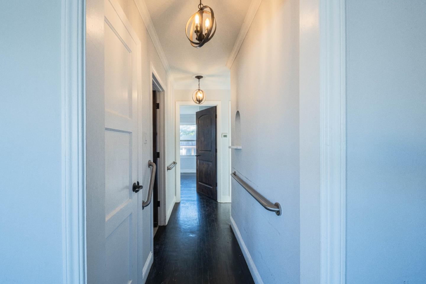 89 Clark Street Salinas, CA 93901 - Photo 15 of 35 a view of a hallway with wooden floor