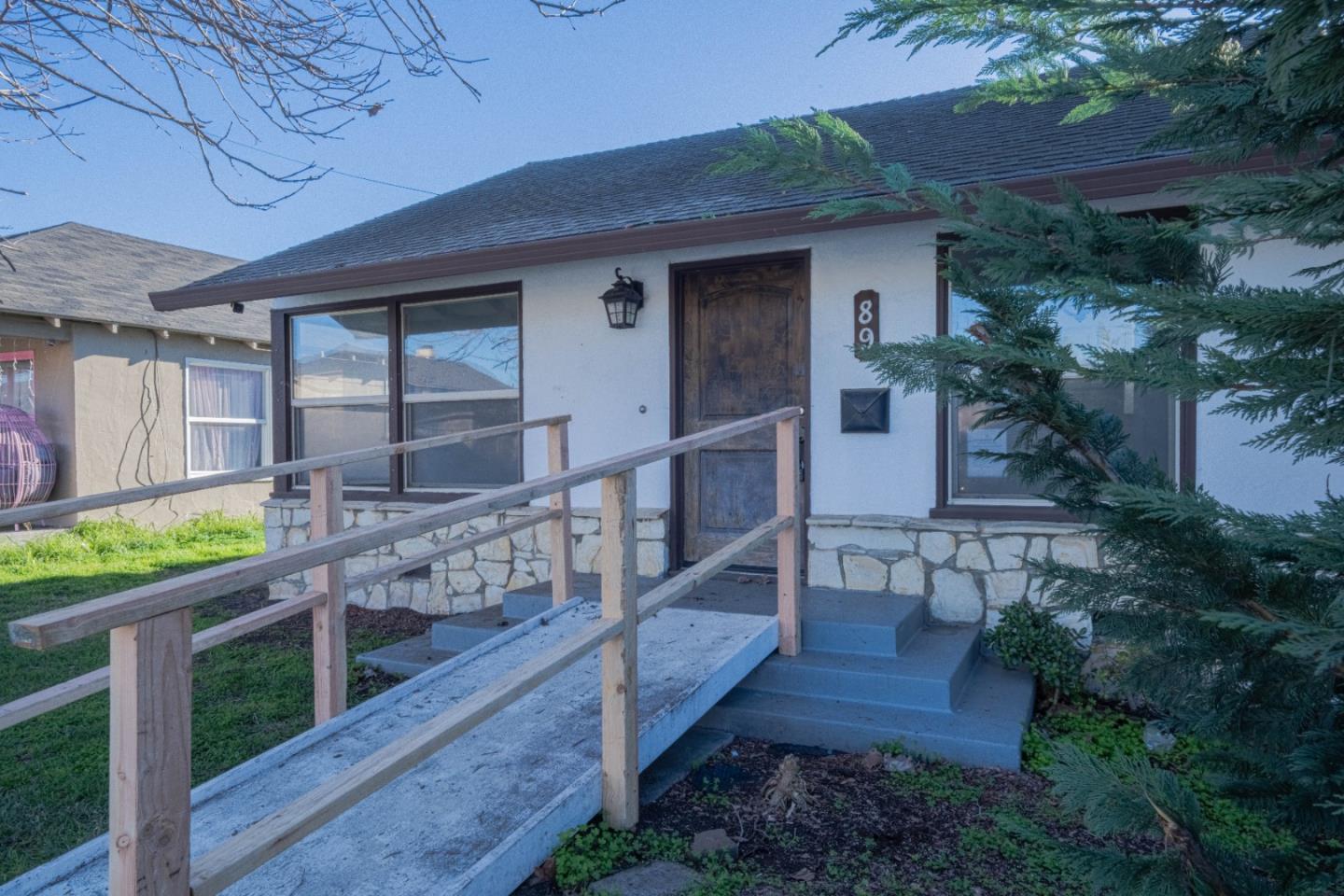 89 Clark Street Salinas, CA 93901 - Photo 2 of 35 a view of a house with wooden fence