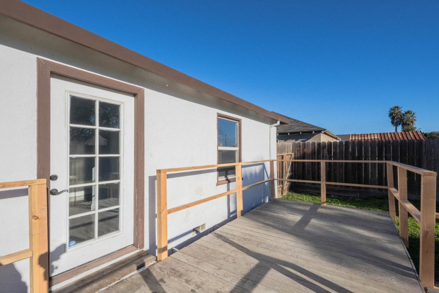 89 Clark Street Salinas, CA 93901 - Photo 22 of 35 a view of an empty room with wooden floor and windows