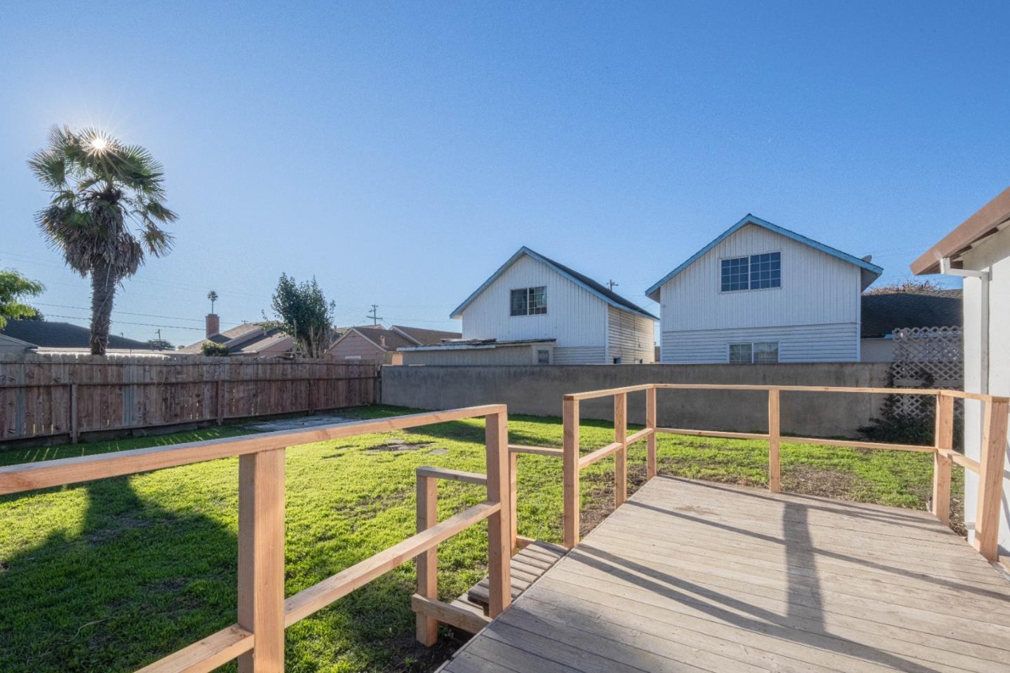 89 Clark Street Salinas, CA 93901 - Photo 23 of 35 a view of a house with wooden floor and a yard