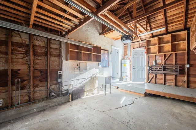 a view of an empty room with a balcony