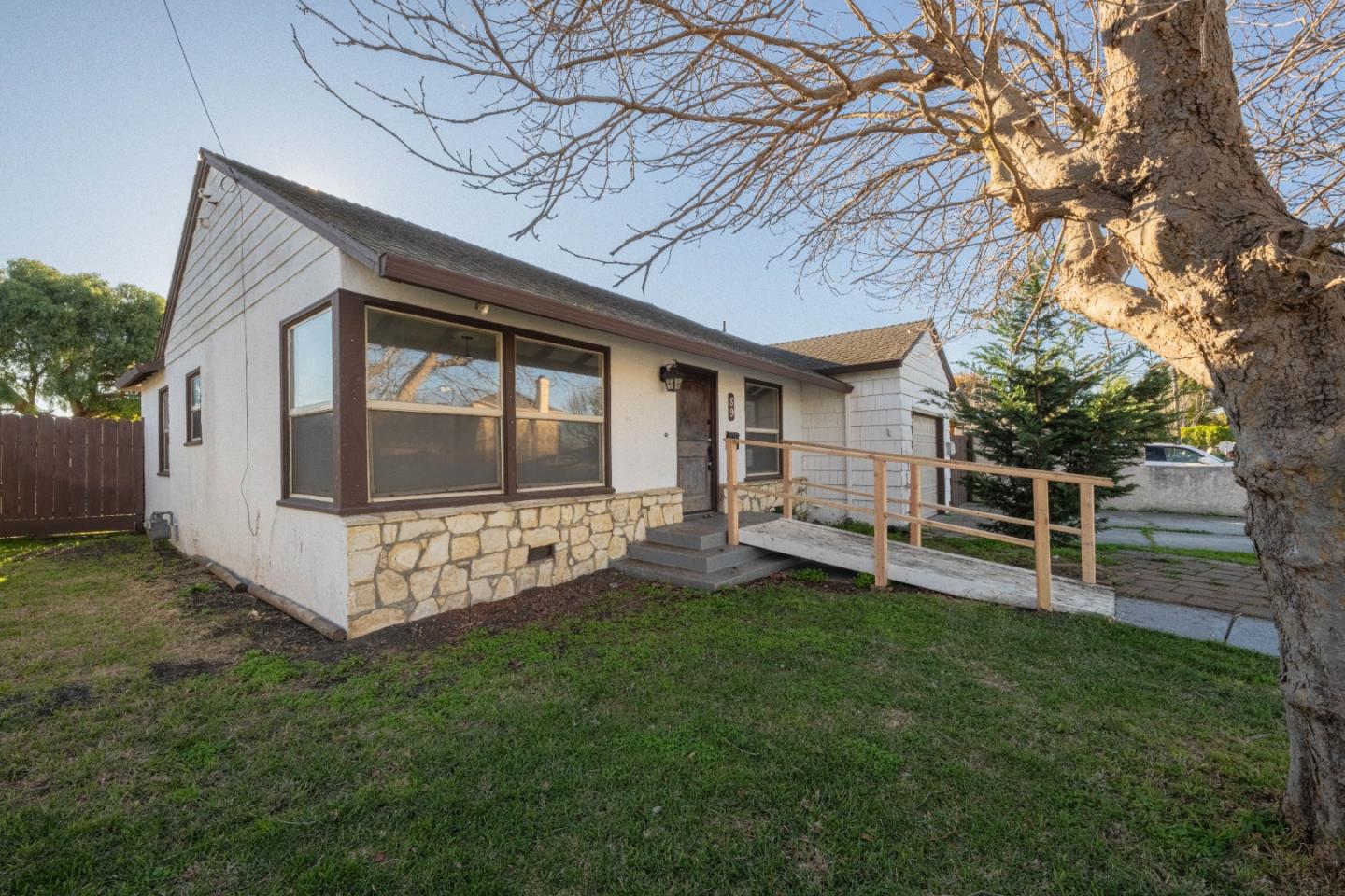 89 Clark Street Salinas, CA 93901 - Photo 3 of 35 a view of a house with a yard and sitting area