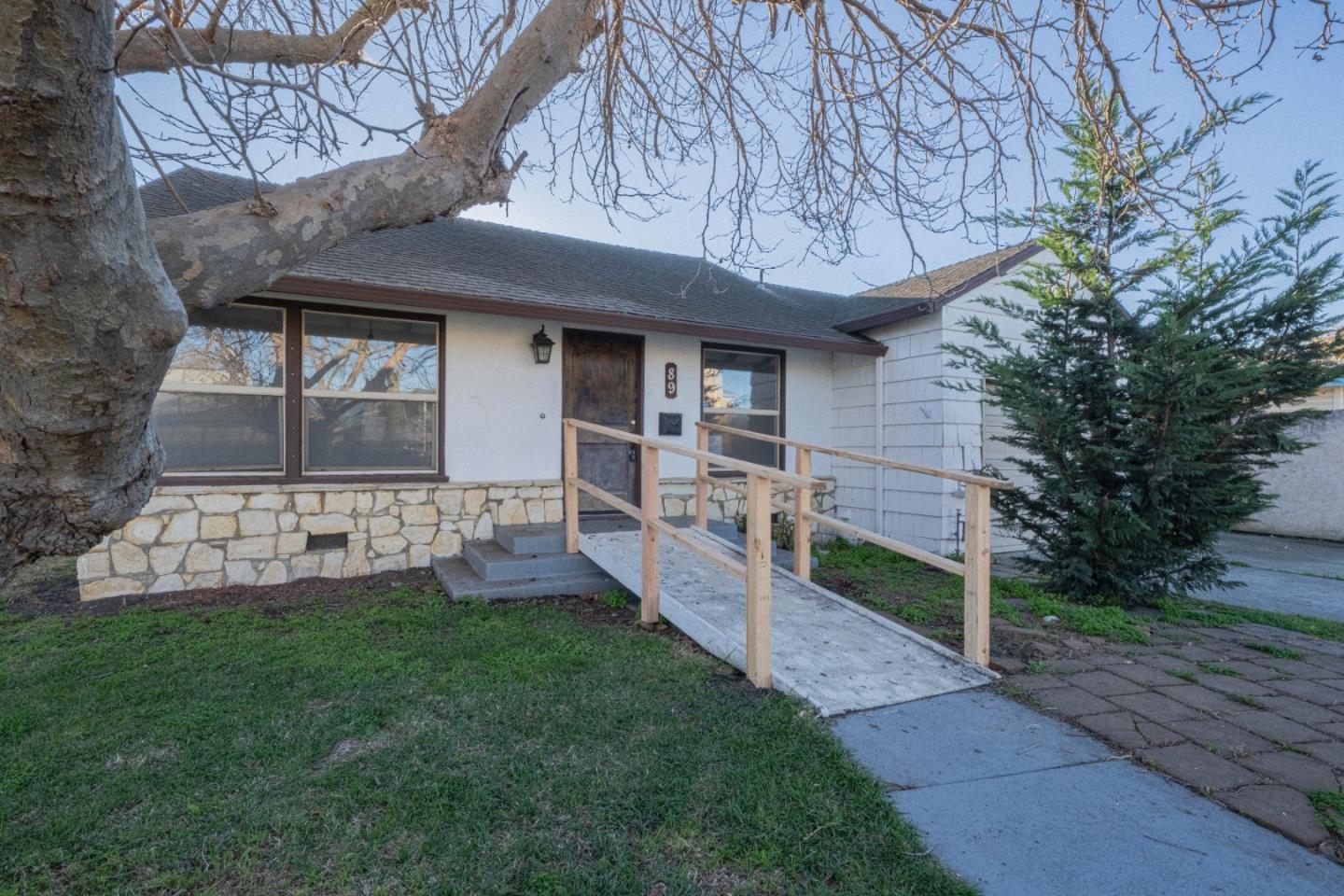 89 Clark Street Salinas, CA 93901 - Photo 4 of 35 a front view of a house with a yard