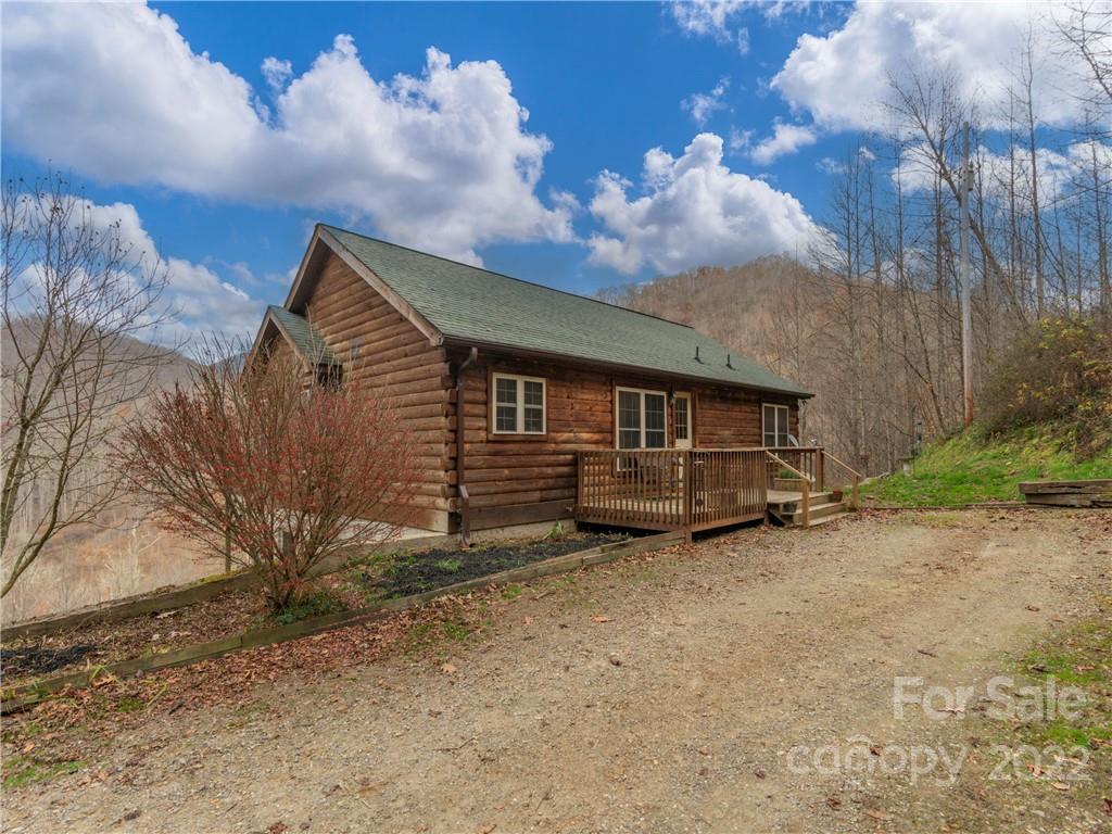 839 Price Town Road Clyde, NC 28721 - Photo 1 of 27 a view of a house with a yard
