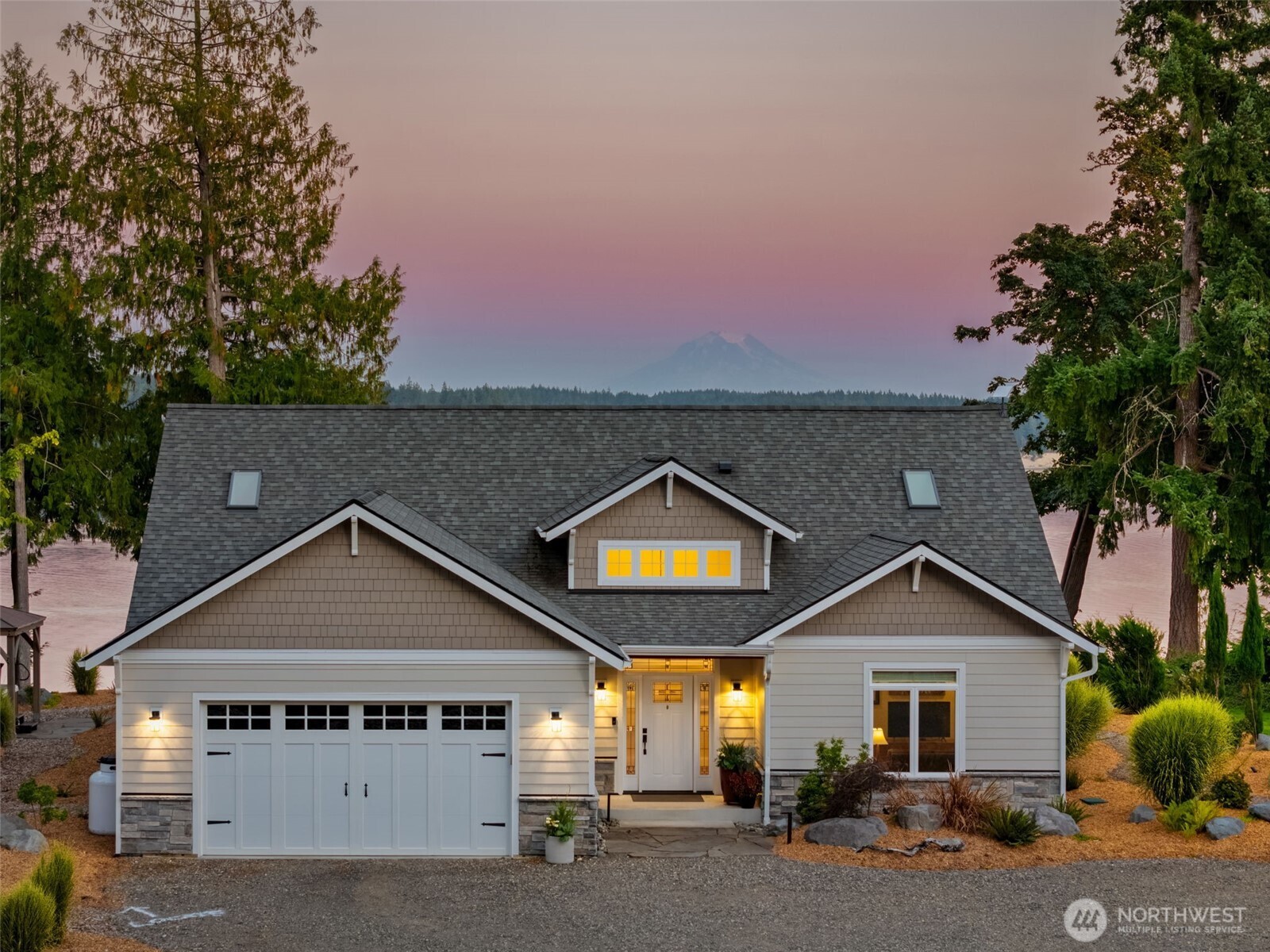 211 East Vineyard Crest Road Grapeview, WA 98546 - Photo 13 of 40 a view of a house with a yard and large tree