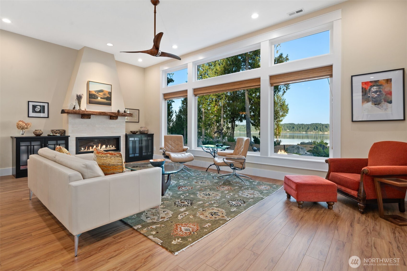 211 East Vineyard Crest Road Grapeview, WA 98546 - Photo 16 of 40 a living room with furniture and a large window